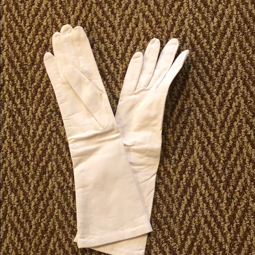 White leather gloves